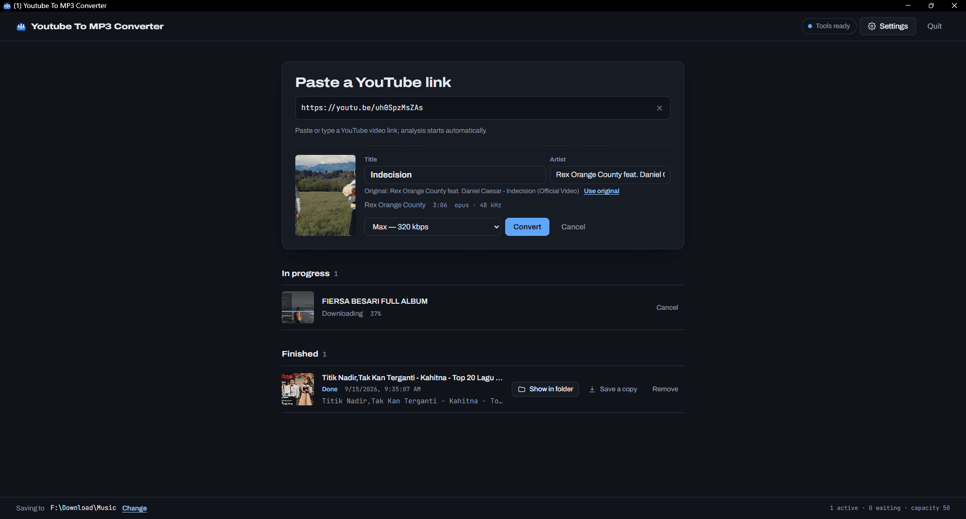 Aplikasi desktop YT To MP3 Converter, menampilkan layar konversi dan antrean job-nya